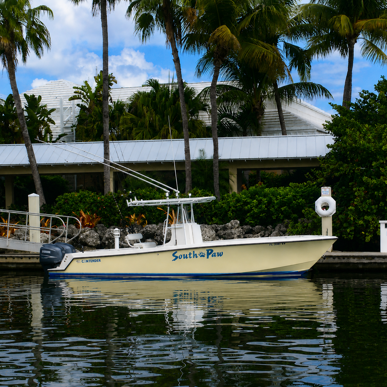 South Paw center console boat docked at a marina